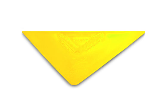 Yellow TRI-EDGE standard tinting tool in action, perfect for professionals.