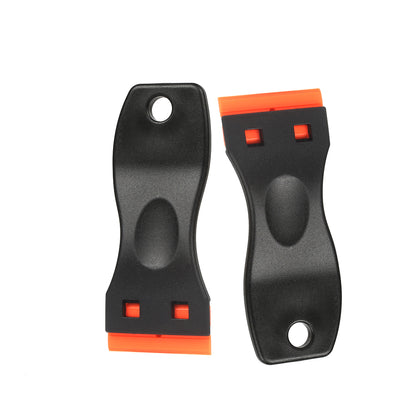 A set of Black Plastic 1-Inch Blade Holder 