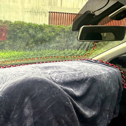 The Dash Protector in action on a car's dashboard, illustrating its effective protection during installation processes.