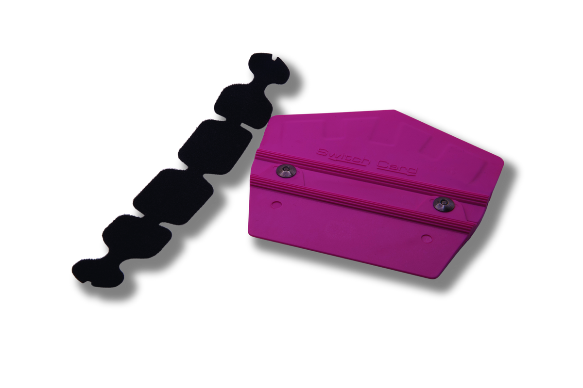 Versatile Purple Switch Squeegee D tool on a vinyl wrapped surface.