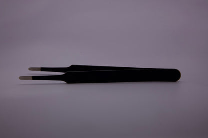 Precision Tweezers being used for precise weeding on vinyl graphics.