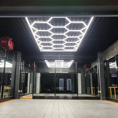 Illuminated garage featuring the stylish Vortex Hexa LED Light ST1028 in a sleek design