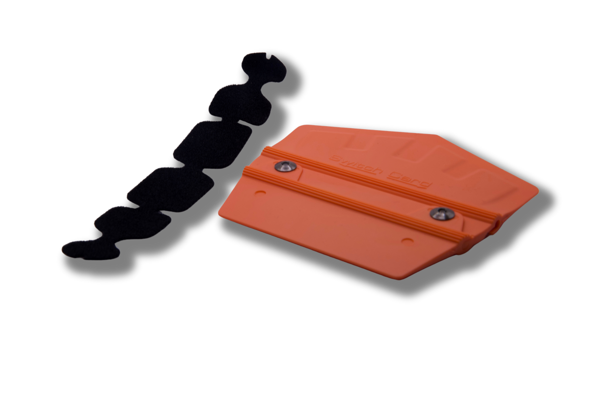 Achieving bubble-free finishes with Orange Switch Squeegee D on a car wrap.
